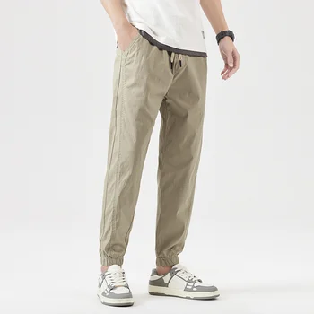 Летние хлопковые мужские брюки на тонких щиколотках, удобные шаровары на завязках, Корейская версия однотонного светло-зеленого цвета  5
